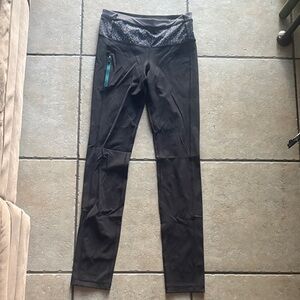 lululemon athletica Black Jeggings with Teal Zip and Patterned Waistband.